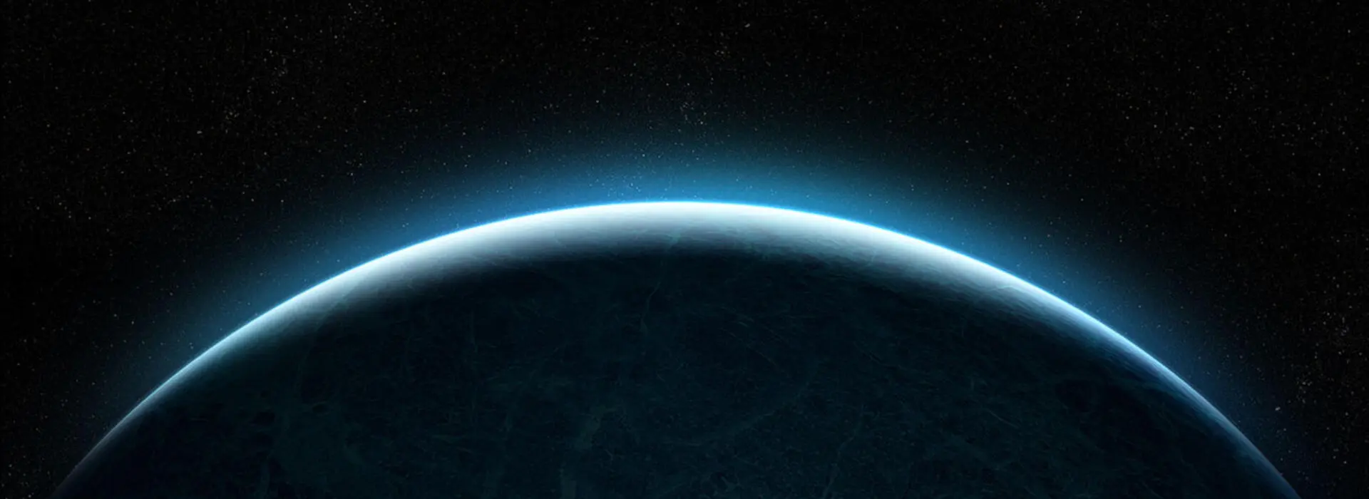 A rising planet in outer space with light shining on a ring-shaped edge and distant stars in the background.