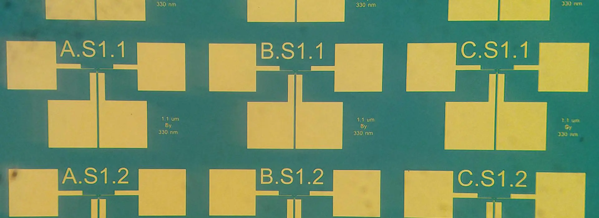 Top-down optical microscope image of several of metal/insulator/metal "MIM" tunnel diodes.