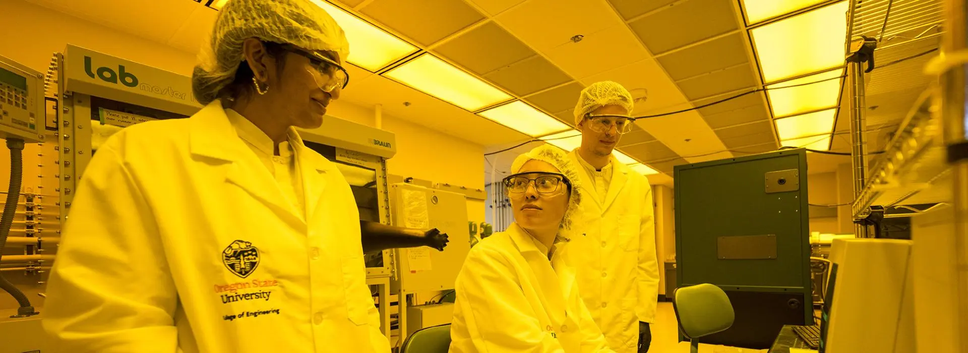 Nirmala Kandadai and students in the clean room