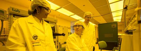Nirmala Kandadai and students in the clean room
